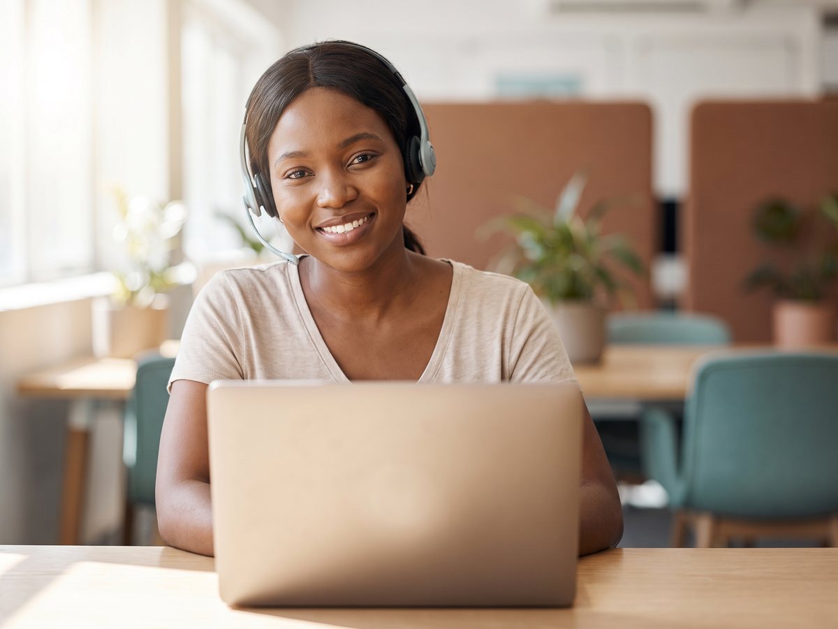 Support specialist at a workspace, ready to help